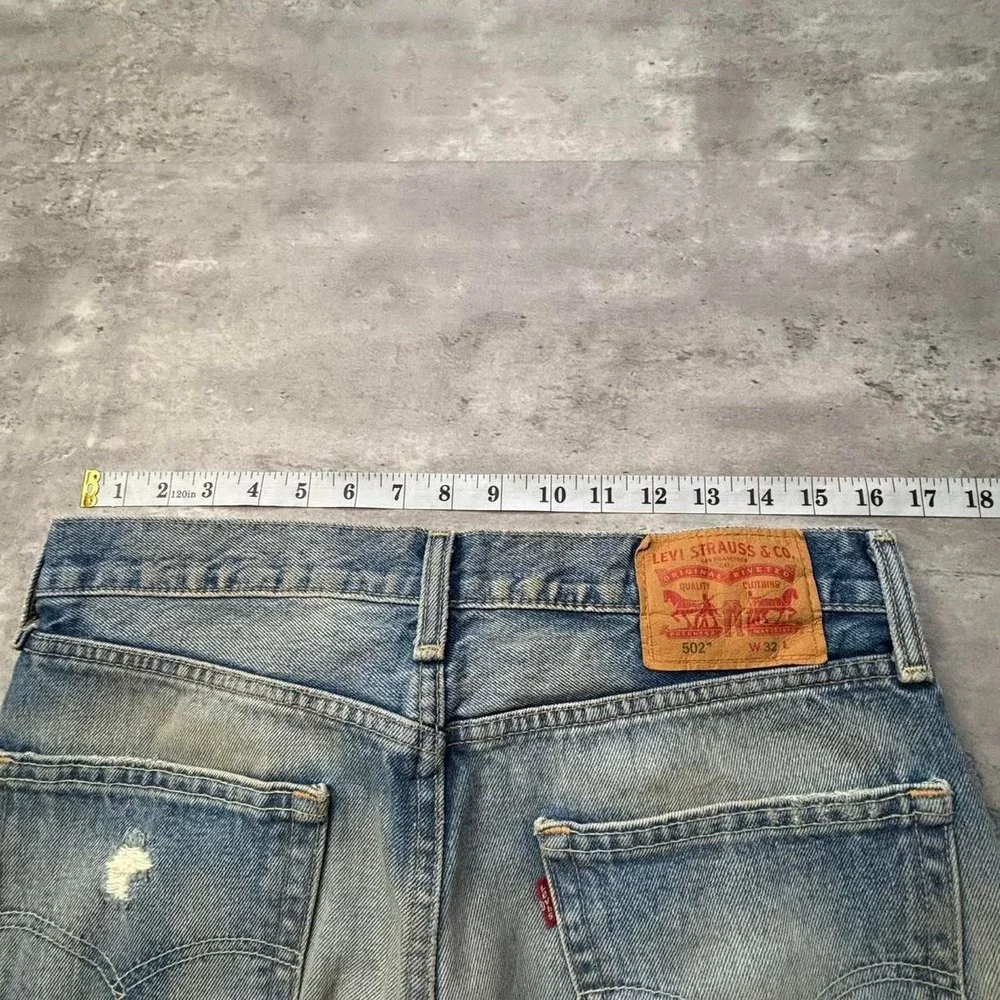 Levi’s 502 Taper Hemmed Shorts Mens 32 Blue Faded Patched Sample Jorts